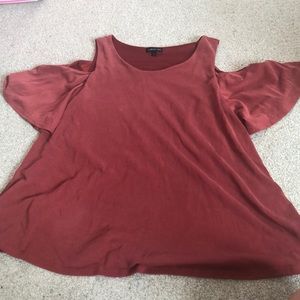 open shoulder burnt orange shirt